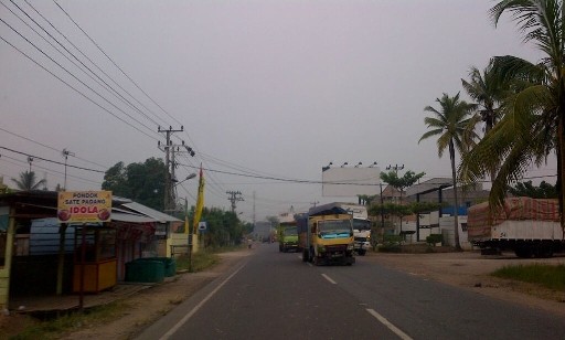 Kabut masih menyelimuti Kota Jambi pagi tadi (15/09)