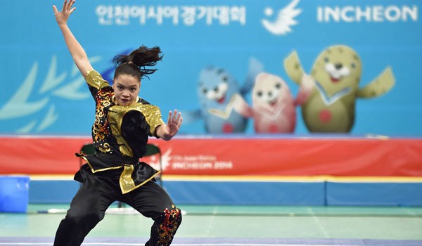 Juwita Niza Wasni, saat beraksi di nomor final womenâ€™s nanquan final The 2014 Asian Games, di Incehon. Foto: Bay Ismoyo/AFP