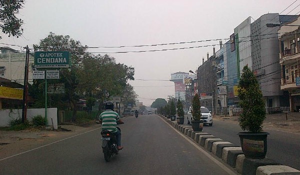 Akibat kabut asap, aktvitas di jalan menjadi sepi