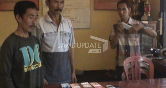 Tersangka Pengedar Uang Palsu.