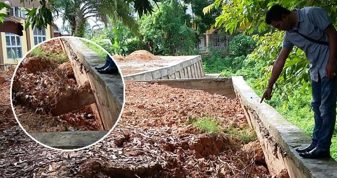 Bangunan turap yang persis dibangun di samping kantor Dispenda sudah mulai retak dan berlobang.