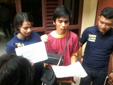 Tersangka Ardiansyah saat diamankan di Mapolsek Jelutung