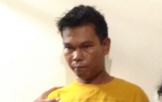 Rudi, saat diamankan di Mapolsek Pasar Jambi