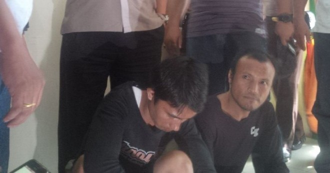 Dua tersangka pembunuhan Kades Muara Kilis.