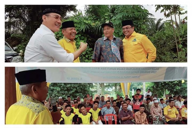 Pasangan Idola bersama Ketua DPD II Golkar Muaro Jambi H Nawawi Hamid saat sosialisasi di Kecamatan Kumpeh Ilir