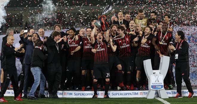 Milan berhasil mengalahkan Juventus lewat adu tendangan penalti. Foto : KARIM JAAFAR/AFP