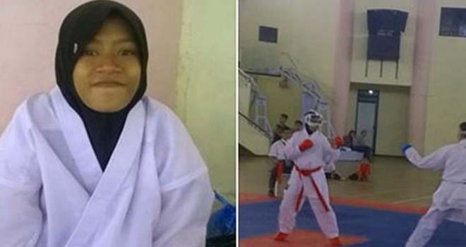 Aulia siswi SMPIT yang tidak mau lepas jilbabnya saat pertandigan karate. Foto : NET