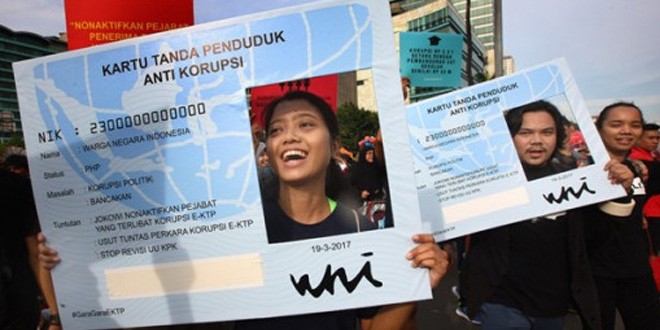 Sejumlah aktivis Antikorupsi melakukan aksi damai di arena Car Free Day Bundaran HI Jakarta, Minggu (19/3/2017). FOTO : MUHAMAD ALI/JAWAPOS