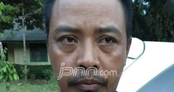 Tersangka AG yang tega memperkosa anak dan keponakan sendiri dan kemudian disiarkan langsung ke sejumlah negara. Foto: Samarinda Pos/JPNN