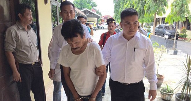 Chairul, dukun gadungan saat diamanak polisi. Foto : JPNN.com