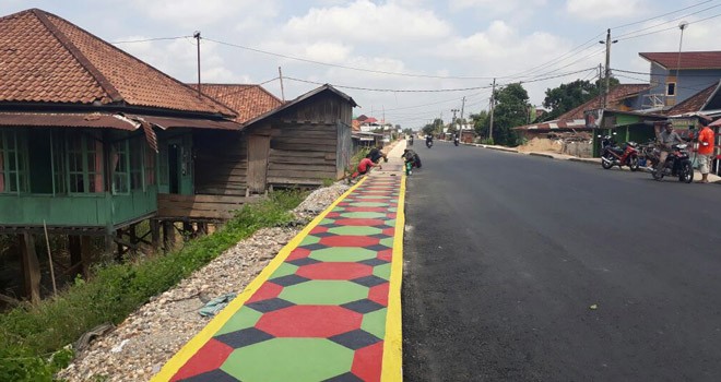 Tampak jalan di kawasan seberang Kota Jambi mulus.