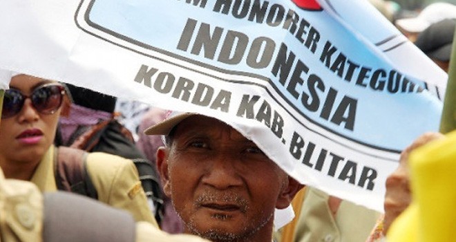 Ilustrasi honorer K2 saat berunjuk rasa.