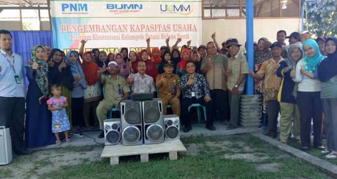 Pihak PT. PNM Cabang Jambi beserta jajaran foto bersama peserta pelatihan.