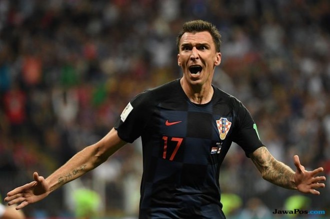 Mario Mandzukic jadi pahlawan kemenangan Kroasia di babak semifinal. (Yuri Cortez/AFP)