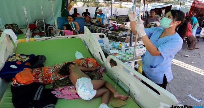 Ilustrasi korban gempa Lombok, NTB. (Dery Ridwansah/JawaPos.com)