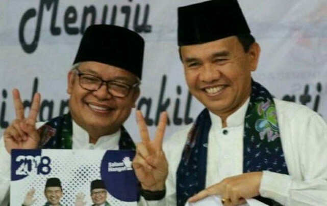 Pasangan Adirozal-Ami Taher.