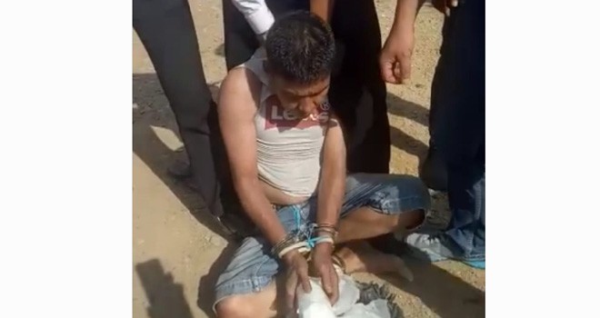 Tersangka berinisial M saat diamankan di kawasan BTN Permata Bungo, Kabupaten Bungo, Senin (29/10).