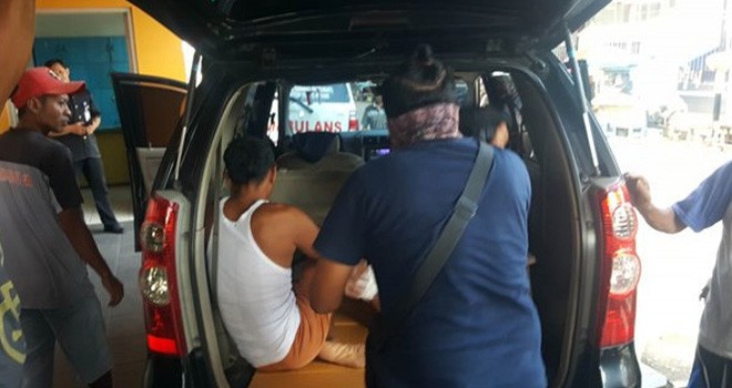 Tersangka pembunuh istri saat dibekuk Polisi. Radar Madiun / JPG