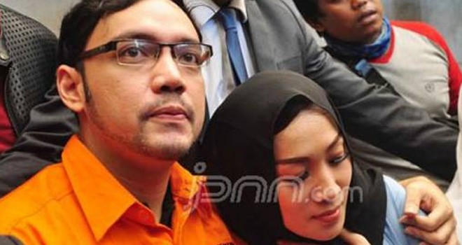 Sandy Tumiwa bersama istrinya Diana Limbong. Foto : JPNN.com