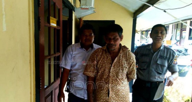 Mijan saat di gelandang Polisi. Foto : Prokal / JPNN