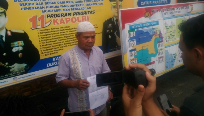 Kasi Kesbangpol Laporkan Wawako Zulhelmi ke Polres Kerinci. Foto : Gusnadi /Jambiupdate