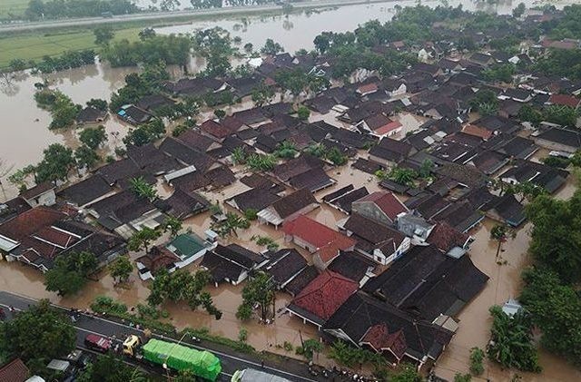 Banjir yang melanda Jawa Timur beberapa waktu lalu. (Rendra Bagus Rahadi/Jawa Pos Radar Madiun)