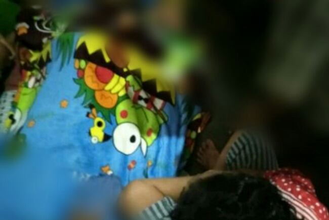 Ramza Nopendi, petugas KPPS Kelurahan Batu Kuning saat disemayamkan di rumah duka. Foto: ist