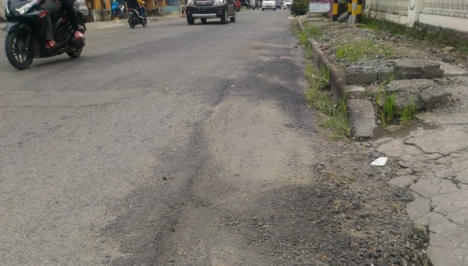 Jalan Tour De Singkarak di Kerinci Dinodai Pihak Ketiga.