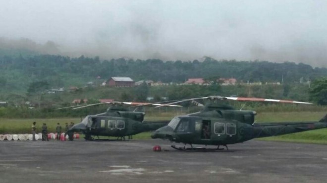Dua unit Heli Bell 412 milik TNI AD yang dikerahkan untuk mencari Helikopter MI 17 No Reg 5138 milik TNI AD yang hilang kontak di Oksibil, Kabupaten Pegunungan Bintang, Papua pada Jumat pekan lalu. (Dokumen Pendam XVII/Cenderawasih)
