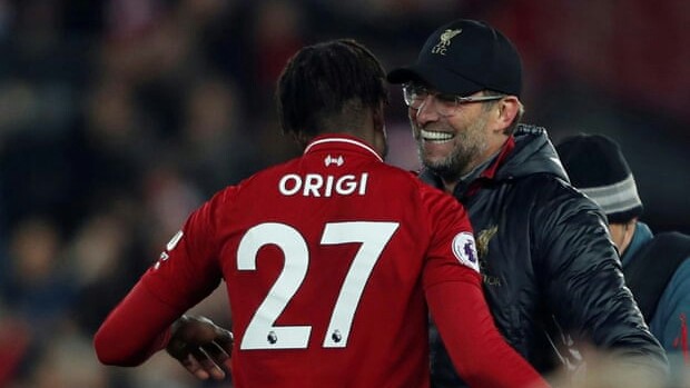 Divock Origi dan Juergen Klopp/Reuters