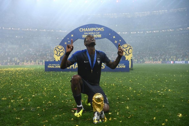 Paul Pogba saat menjuarai Piala Dunia 2018/Getty Images