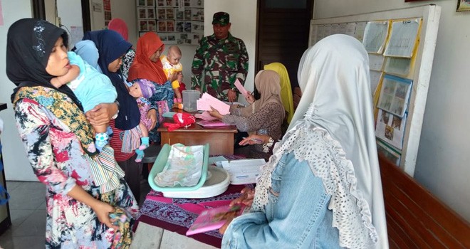 Satgas TMMD Reg 105 Kodim Demak, Bantu Pelayanan Posyandu.
