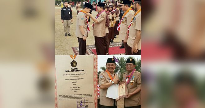 Bupati Adirozal Terima Penghargaan Tertinggi Lencana Melati.