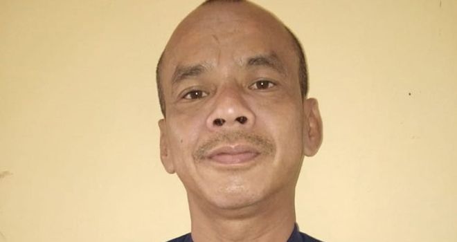 Abdulah Fikri (43)? warga Kampung VII , Desa Beringin Makmur II, Kecamatan Rawas ilir, Kabupaten Muratara, diciduk polisi di lapangan bola.