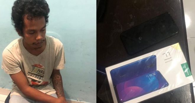 caption: Kolase Tersangka DE (25) berikut BB Hp Oppo F11. 