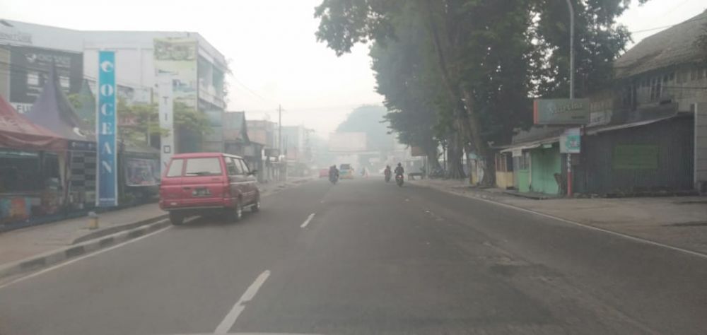 Kondisi kabut di Kota Jambi pagi ini (16/10).