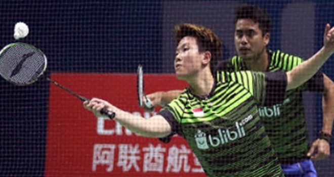 
Tontowi Ahmad saat berpasangan dengan Liliyana Natsir.

 

