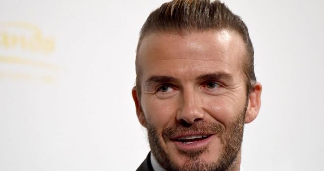 Former football player David Beckham answers questions during a promotional casino event in Tokyo on October 4, 2017. 