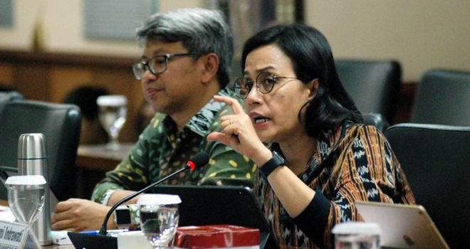 Menteri Keuangan RI, Sri Mulyani memberikan keterangan dalam rapat kerja (Raker) dengan Komite IV DPD RI di Ruang Rapat Komite IV Gedung Parlemen Senayan, Jakarta, Selasa (14/1/2020). Dalam raker tersebut dibahas tentang postur APBN 2020 dan Jenis Dana Transfer ke Daerah berdasarkan peruntukannya.
