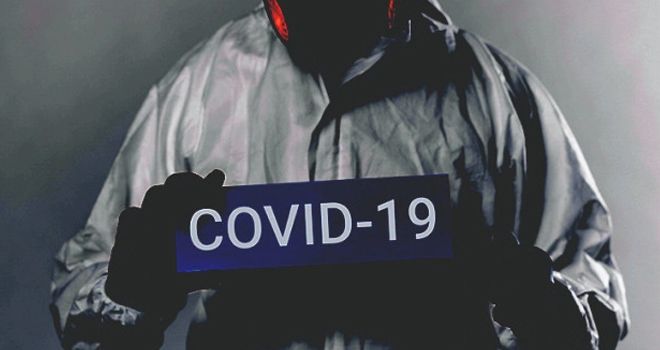 Ilustrasi Covid-19.

