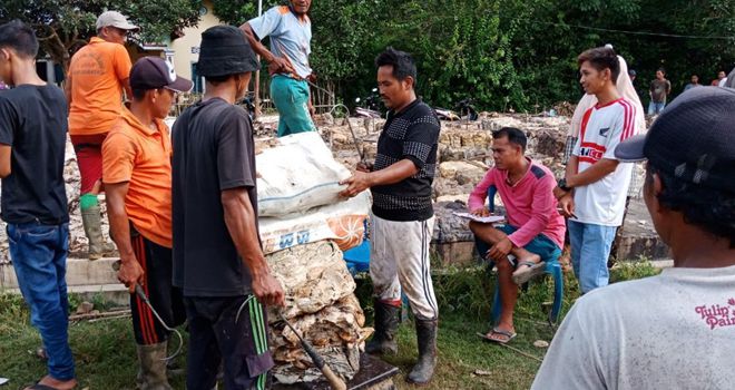 Pasar Lelang Karet Dusun Tanjung Agung.
