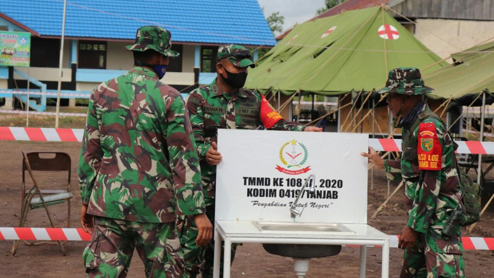 TMMD Kodim Tanjab Peduli Covid 19, Siapkan tempat Cuci Tangan di Poskotis