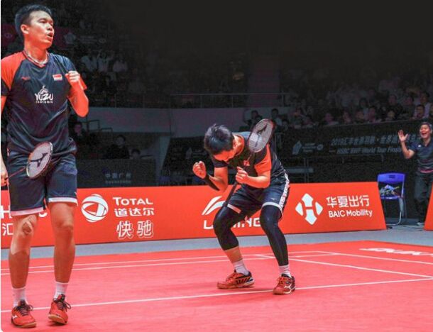 Hendra Setiawan dan Mohammad Ahsan / AP Photo