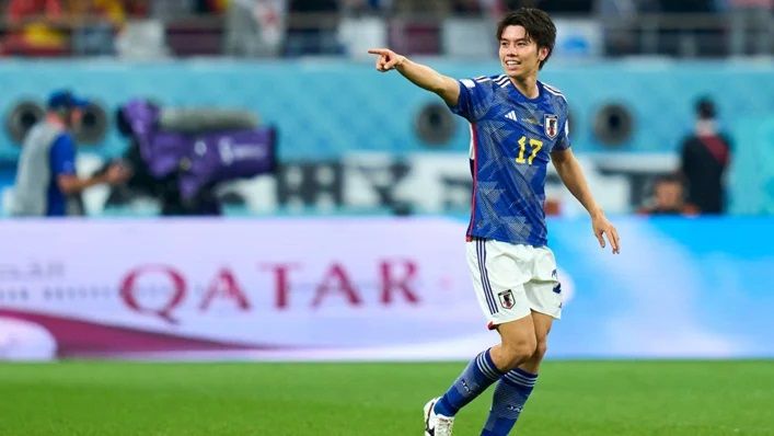 Ao Tanaka merayakan gol kedua Jepang melawan Spanyol di Khalifa International Stadium.
